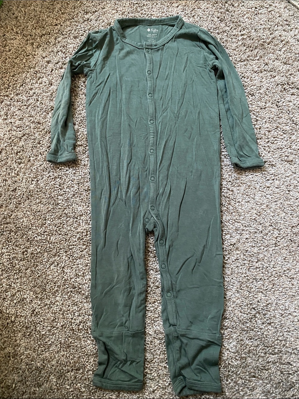 Kyte Baby unisex romper with a snap closure.